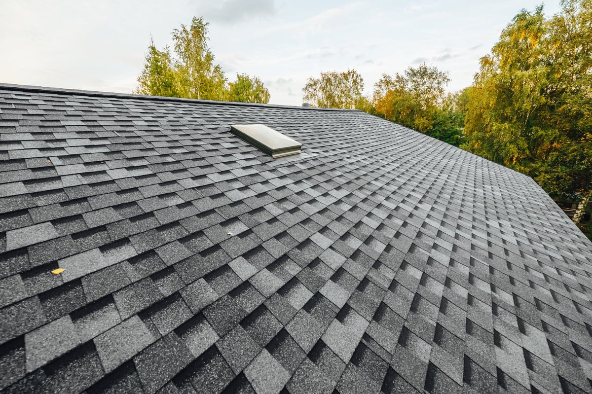 New architectural shingle roof being installed on a Tampa Bay home